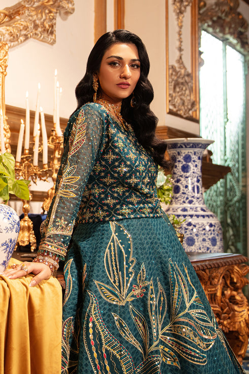 Close-up of naqshi zeemal sleeve showcasing dangling sequin hangings, embroidered sleeve border and meticulous hand‑adda edging.